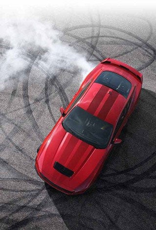 Overhead view of a 2024 Ford Mustang® model with tire tracks on pavement | Harbin Motor Company in Scottsboro AL